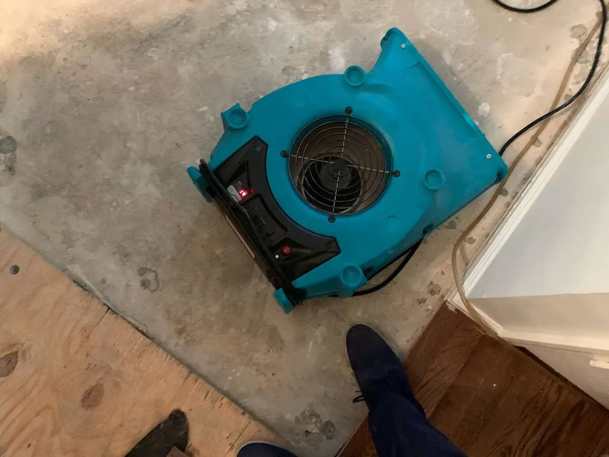 Air mover drying subfloor during Leak Detection & Repair in Moorpark